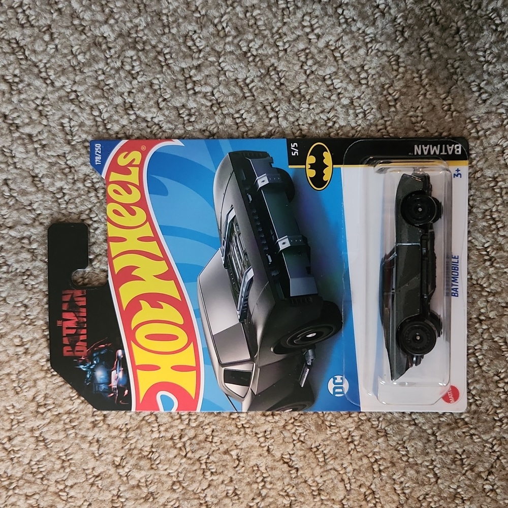 Hot Wheels diecast vehicle, the Batman Batmobile,  charcoal grey.